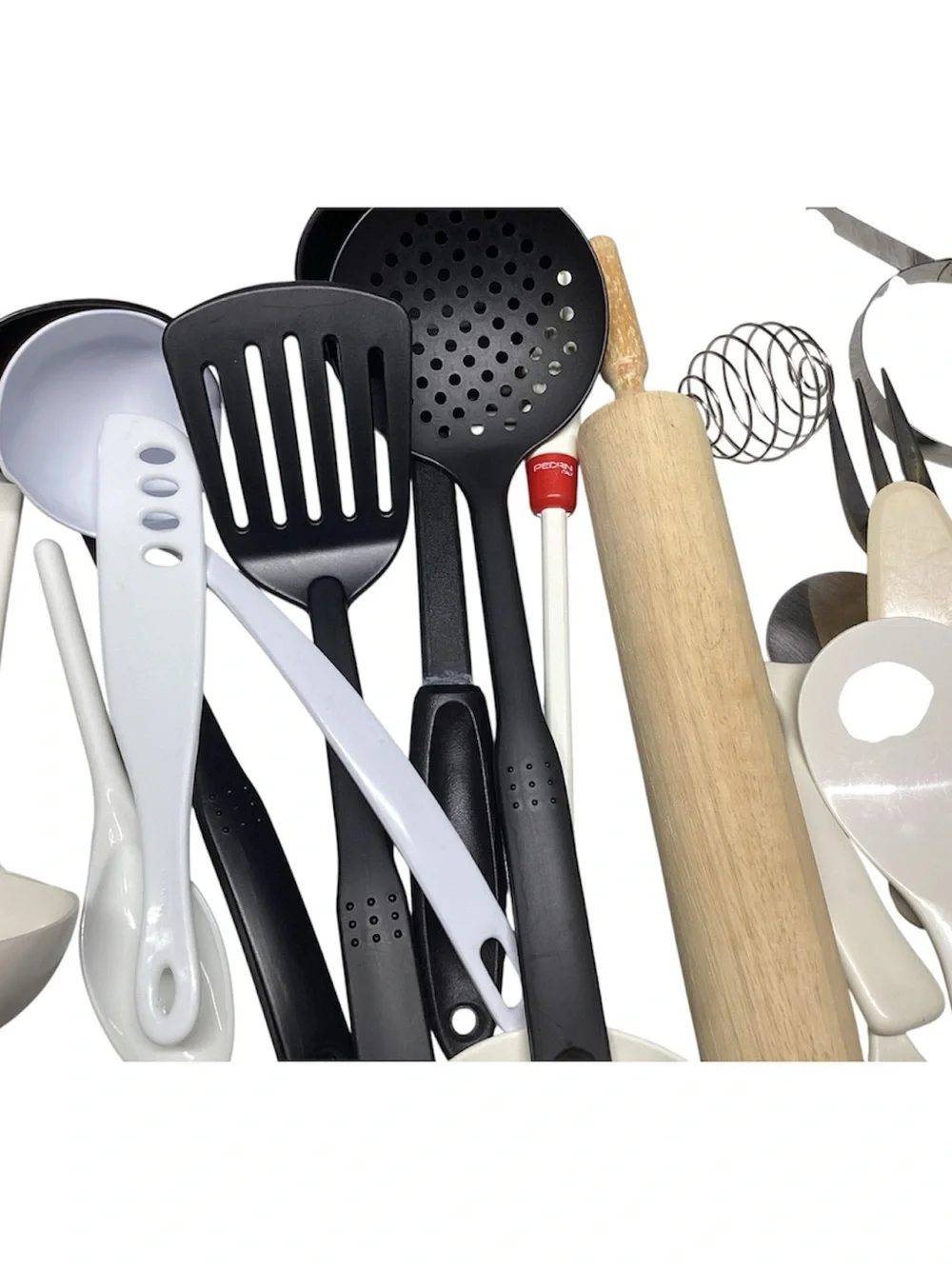 A little over 4 pounds of Assorted Kitchen Utensils